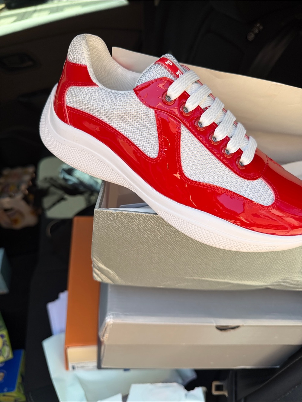 Prada Red and White Patent Mesh Sneakers
